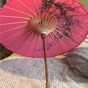 Chic Pink Parasol with Floral Accents